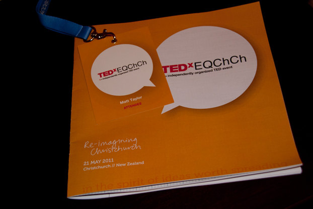 The TEDxEQChCh name tag and programme looking very flash.